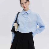 Woman's Light Blue Button-Down Shirt with Pointed Collar
