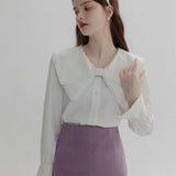 Vintage-Inspired Blouse with Scalloped Collar and Cuff Detail