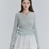 Chic Comfort: Classic Cardigan with Soft Texture and Button-Down Elegance