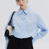 Woman's Light Blue Button-Down Shirt with Pointed Collar