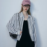 Women's Classic Vertical Striped Button-Down Shirt with Point Collar and Pocket Detail