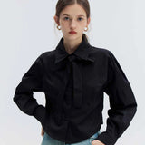 Chic Black Tie-Front Cropped Blouse with Elegant Rose Knot