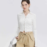 Stylish White Crop Top with Lace-Up Front and Contrast Stitching