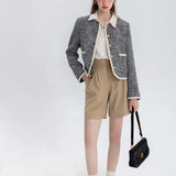 เสื้อแจ็คเก็ตสตรีสไตล์ Chanel ผ้าทวีตสีดำและสีขาวคลาสสิก