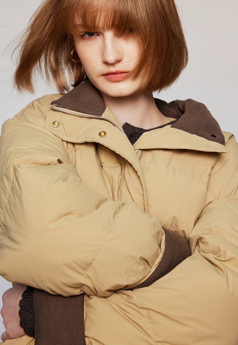 Women's Puffer Jacket with High Collar and Front Snap Pockets
