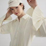 Women's Pleated Button-Down Shirt with Tassel Cuff Detail