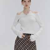 Chic Cut-Out Knit Top with Tie Detail – A Fresh Take on Casual Elegance