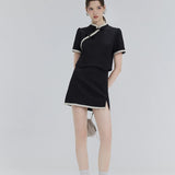 Contemporary Collared Cape Blouse and Pleated Mini Skirt Set