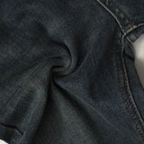 กางเกงยีนส์สีดำบานเก๋สำหรับผู้หญิงที่มีสำเนียง Rivet