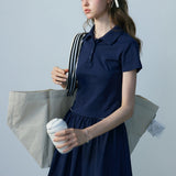 Women's Two-Piece Set: Polo Crop Top and Pleated Skirt