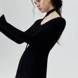 Sleek Black Ribbed Knit Dress with Unique Neckline Detail