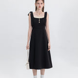 Sophisticated Black Dress with Button Accents and Shoulder Straps