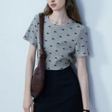 Chic Ribbed Short-Sleeve Top with Bow Motifs