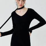 Sleek Black Ribbed Knit Dress with Unique Neckline Detail